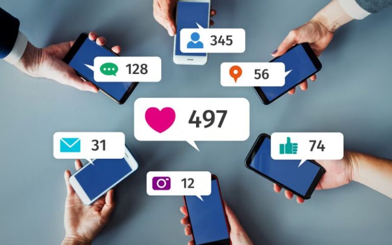 Hands holding smartphones displaying social media engagement icons like likes, followers, comments, and shares — concept of using social media tools for affiliate marketing success.