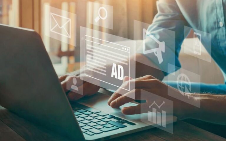 Digital marketing professional using a laptop for Crafting Engaging and Shareable Content and content strategy.